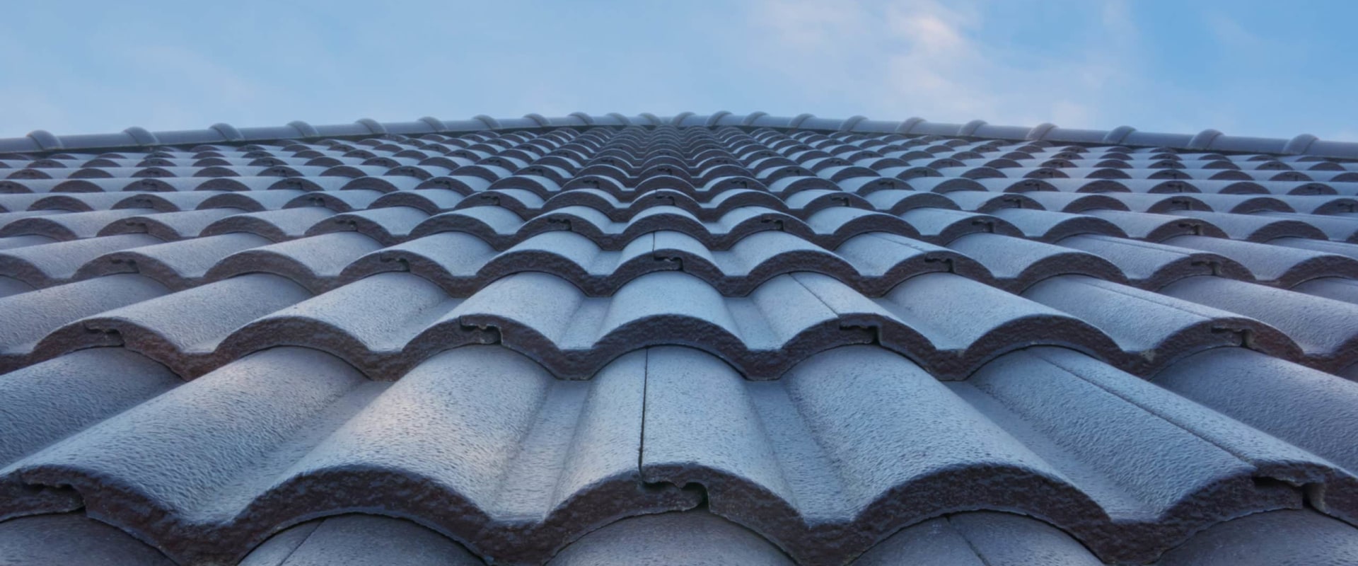 What is the average cost of replacing a tile roof?
